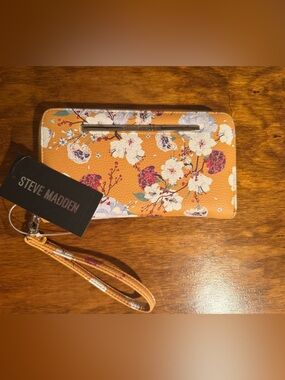 Steve Madden Orange Floral Wallet Phone Case with Wrist Strap